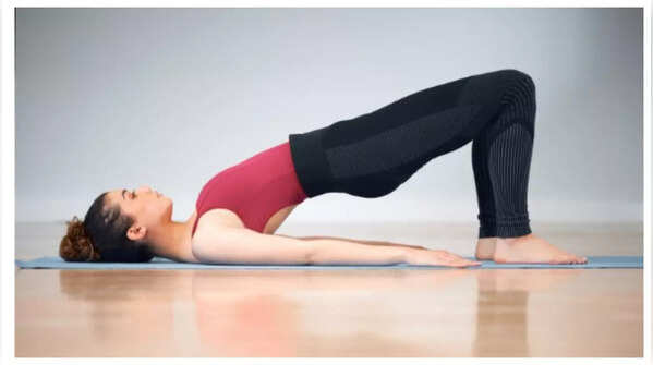 Executing Setu Bandhasana or Bridge Pose