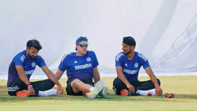 Arshdeep Singh and Akash Deep wrestling with bowling coach Morne Morkel